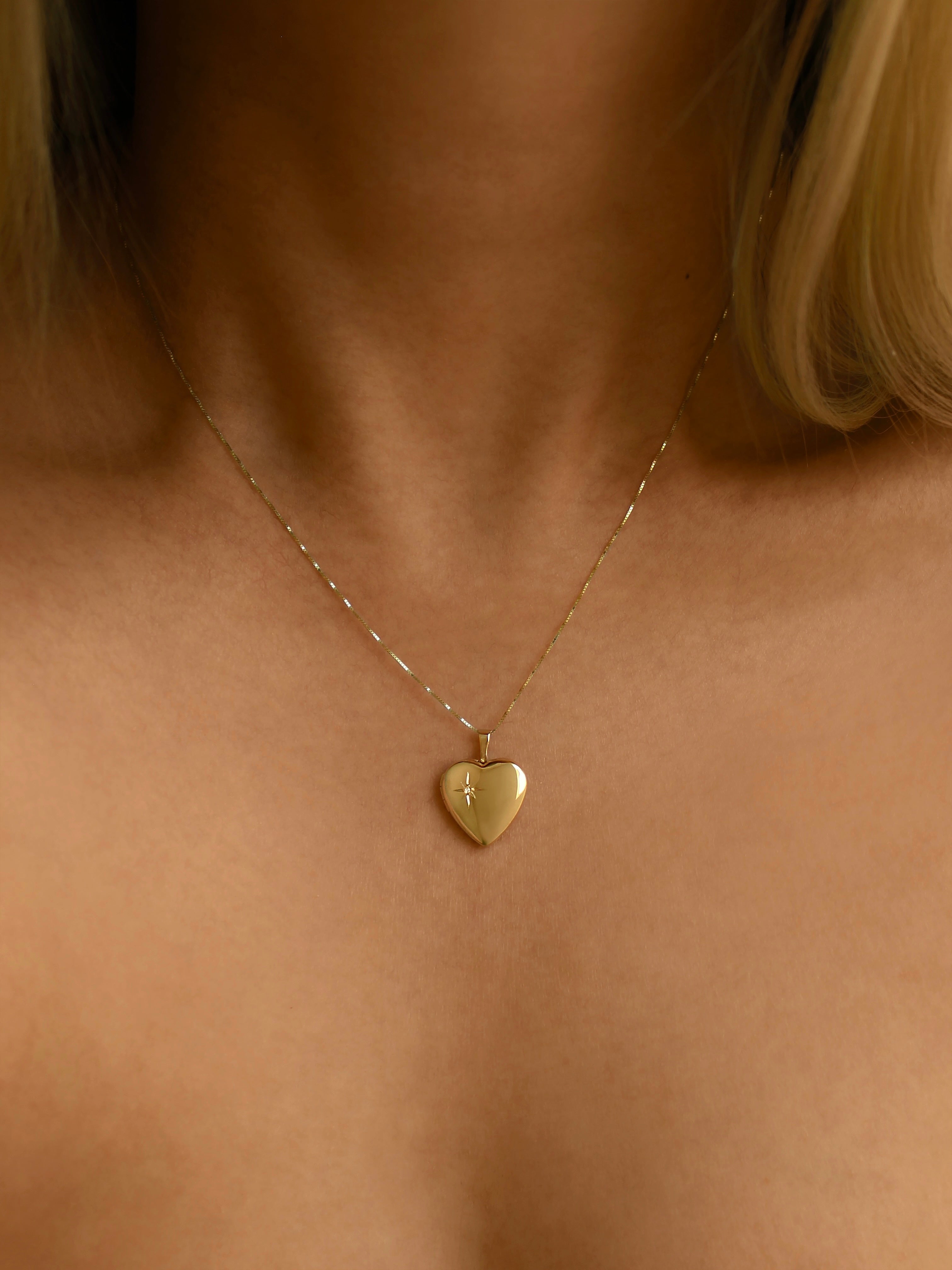 Small gold store locket necklace