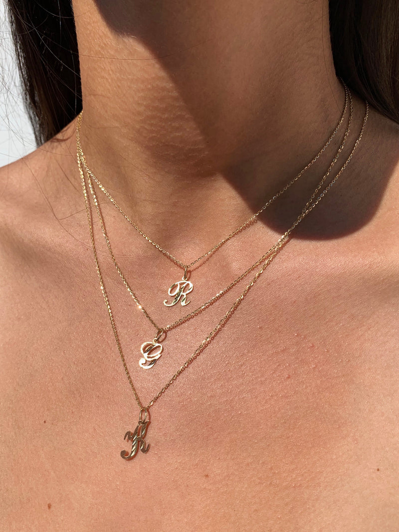 18 Letter Necklaces to Honor Your Kids, Partner Or Just Yourself